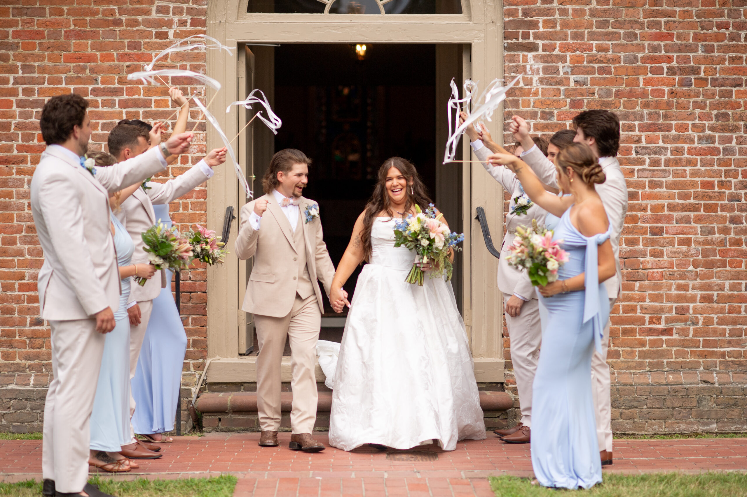 BRIDE AND GROOM CHURCH EXIT